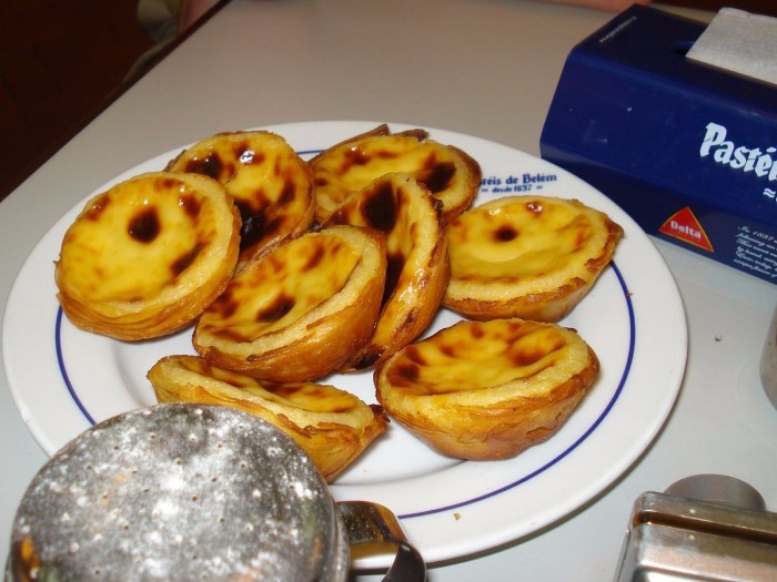 bite-into-sublime-custard-tarts-with-flavors-of-lemon-cinnamon-and-vanilla-in-portugal-the-most-iconic-shop-is-antiga-confeitaria-de-belm-in-lisbon-custom