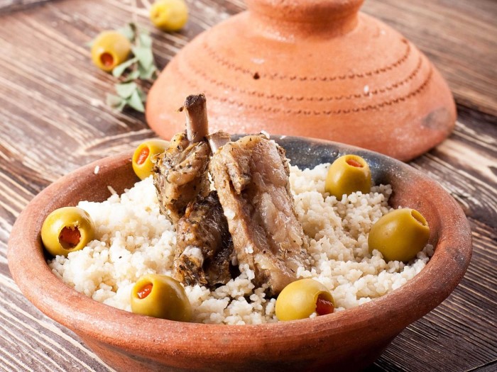 breathe-in-the-fragrant-aroma-of-lamb-tagine-a-sweet-rich-and-flavorful-stew-from-morocco-its-usually-made-with-lamb-raisins-almonds-and-spices-and-served-over-couscous-custom