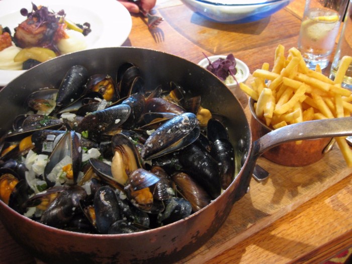 dig-into-a-steaming-bowl-of-moules-frites-in-belgium-custom