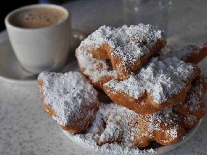 get-some-fresh-hot-beignets-a-type-of-deep-fried-pastry-topped-with-powdered-sugar-the-most-famous-place-to-try-them-is-cafe-du-monde-in-new-orleans-custom